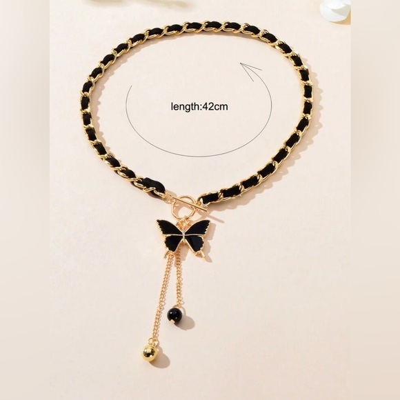 Elegant Gold and Black Butterfly Charm Necklace - Picture 4 of 4